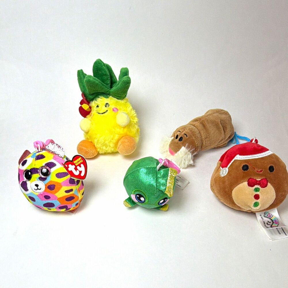 Lot of 5 backpacks clips, pineapple & various Animals